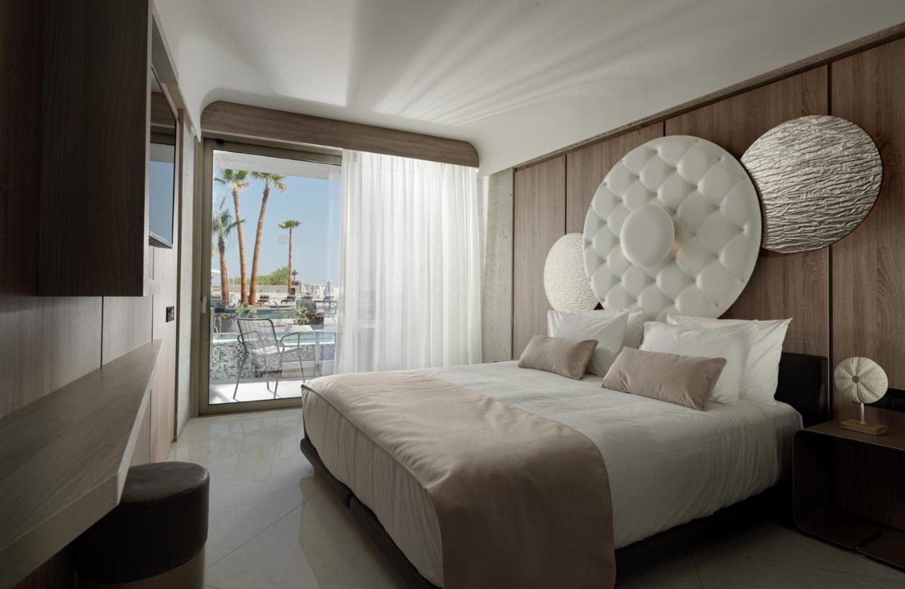 Nautilux Rethymno By Mage Hotels ภายนอก รูปภาพ A room at the hotel